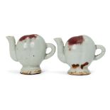 Two Chinese porcelain miniature Cadogan teapots, 19th century, covered in a pale blue glaze with