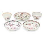 Two Chinese porcelain teabowls, a pair of saucers, and a dish, 17th - 18th century, the dish painted