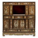 A Chinese mother of pearl inlaid cabinet, 19th century, with arrangement of drawers and cabinet