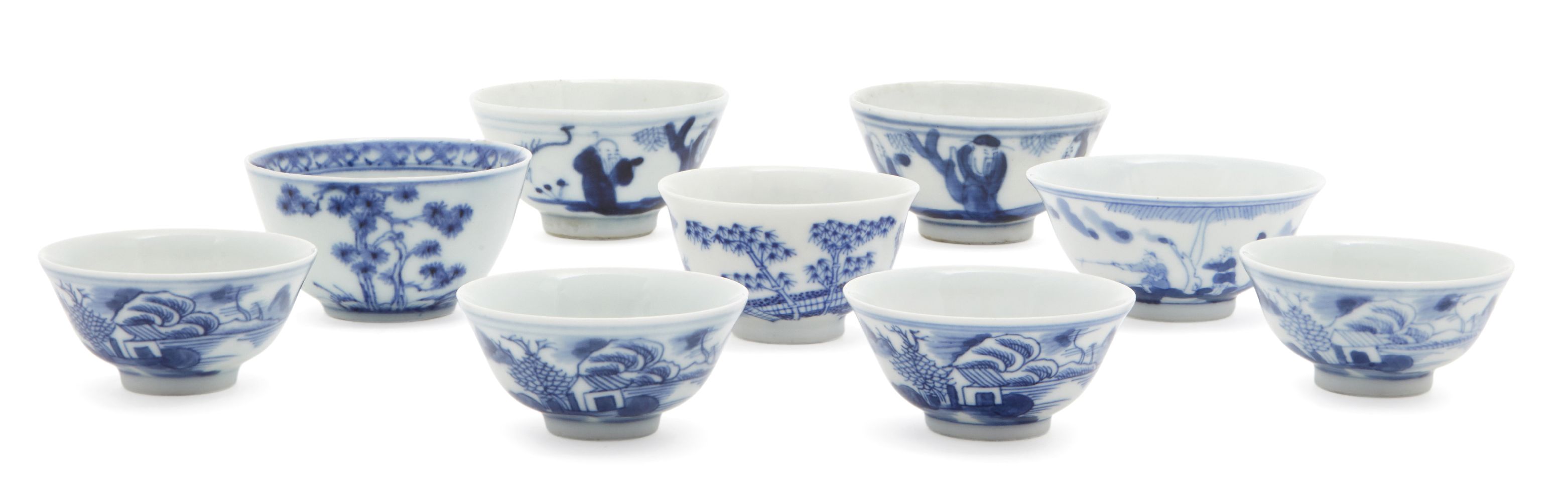 Nine Chinese porcelain wine cups, 18th-19th century, painted in underglaze blue with scenes of