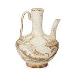 A Chinese grey stoneware Cizhou ewer, deeply incised beneath the transparent pale glaze with a