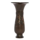 A Chinese bronze archaistic vase, Ming dynasty, 17th century, decorated to the waisted neck with a