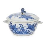A Chinese porcelain bowl and cover, Kangxi period, painted in underglaze blue with chrysanthemum and