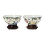 A pair of Chinese porcelain bowls, Republic period, painted in famille rose enamels with red crested