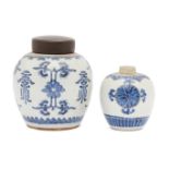 Two Chinese porcelain jars, 18th century, painted in underglaze blue with stylised floral sprays,