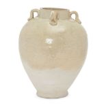 A Chinese pottery straw-glazed jar, Tang dynasty, with four loop handles to shoulder, the