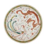 A Chinese porcelain 'dragon and phoenix' dish, Guangxu mark and of the period, finely painted in