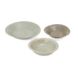 Three Chinese Longquan celadon small dishes, Song - Yuan dynasty, each with differing hues of