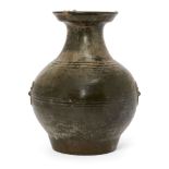 A Chinese bronze-imitation pottery jar, Hu, Han dynasty style, the sides moulded with taotie mask