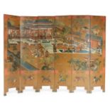 A pair of Chinese six-panel lacquer screens, late Qing dynasty, painted to one side with floral