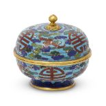 A Chinese gilt bronze and cloisonné circular box and cover, 18th century, with knop finial,