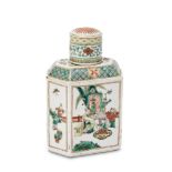 A Chinese porcelain tea caddy and cover, 19th century, painted in famille verte enamels with