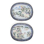 A pair of Chinese Canton enamel oval dishes, early 19th century, each painted with expansive