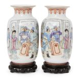A pair of Chinese porcelain vases, Republic period, painted in famille rose enamels with soldiers