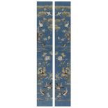 A pair of Chinese silk embroidered sleeves, early 20th century, decorated with a landscape with