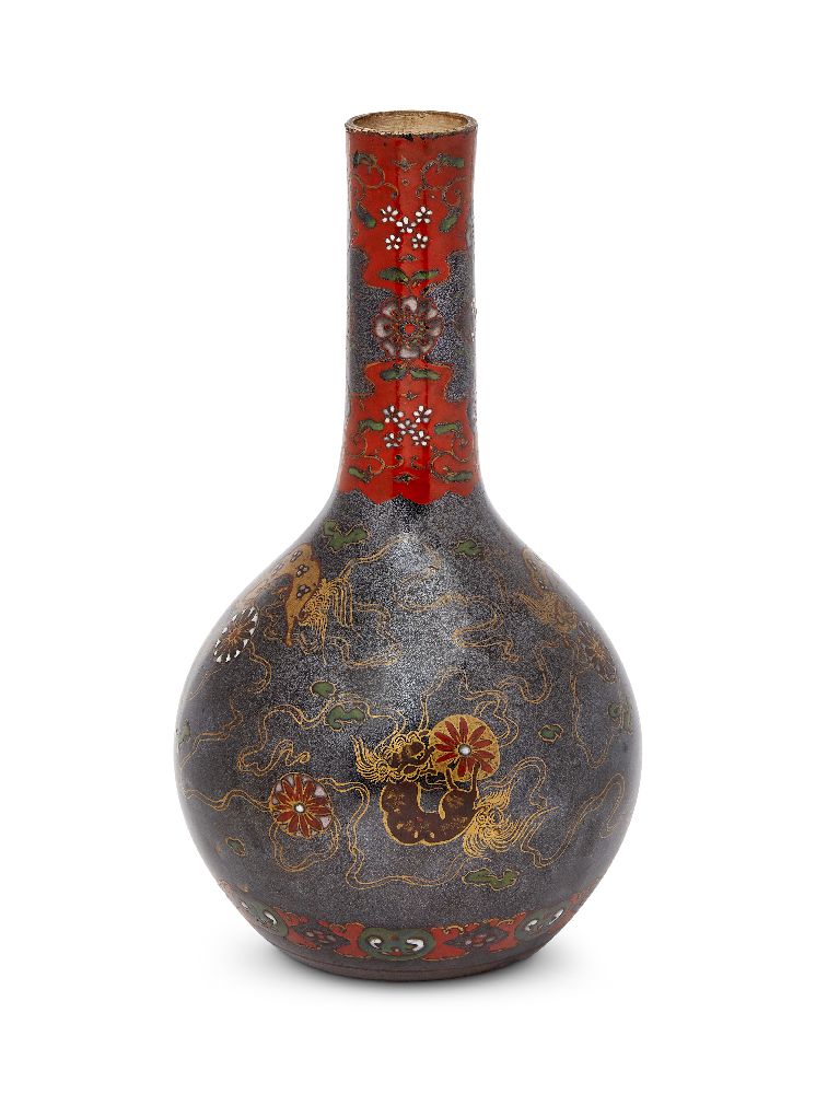 A Chinese porcelain monochrome bottle vase, 17th century, covered with a black silver-speckled