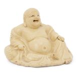 A Japanese pottery figure of Hotei, 19th century, modeled seated on his bindle with laughing