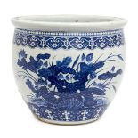 A large Chinese porcelain jardinière, 19th century, painted in underglaze blue with a phoenix amidst