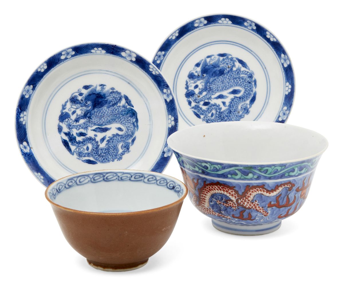 A pair of small Chinese porcelain dishes, Kangxi period, painted in underglaze blue to the central