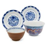 A pair of small Chinese porcelain dishes, Kangxi period, painted in underglaze blue to the central