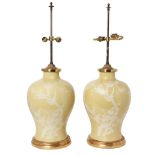 A pair of Chinese porcelain yellow ground baluster vases, early 20th century, each decorated in