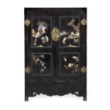 A pair of early Chinese black lacquer and inlaid cabinets, late Qing dynasty, each door set with