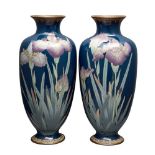 A pair of large Japanese cloisonné baluster vases, Meiji period, decorated with irises on a blue