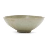 A Chinese grey stoneware Longquan celadon bowl, Song dynasty, covered in an olive-green glaze, the