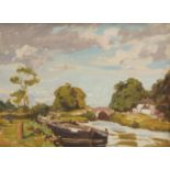 Dermod O'Brien PRHA, Irish 1865-1945- A landscape with a moored boat; oil on canvas, bears studio