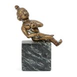 A bronze figure of a seated figure holding a flower on a marble base, India, 19th centuryPlease
