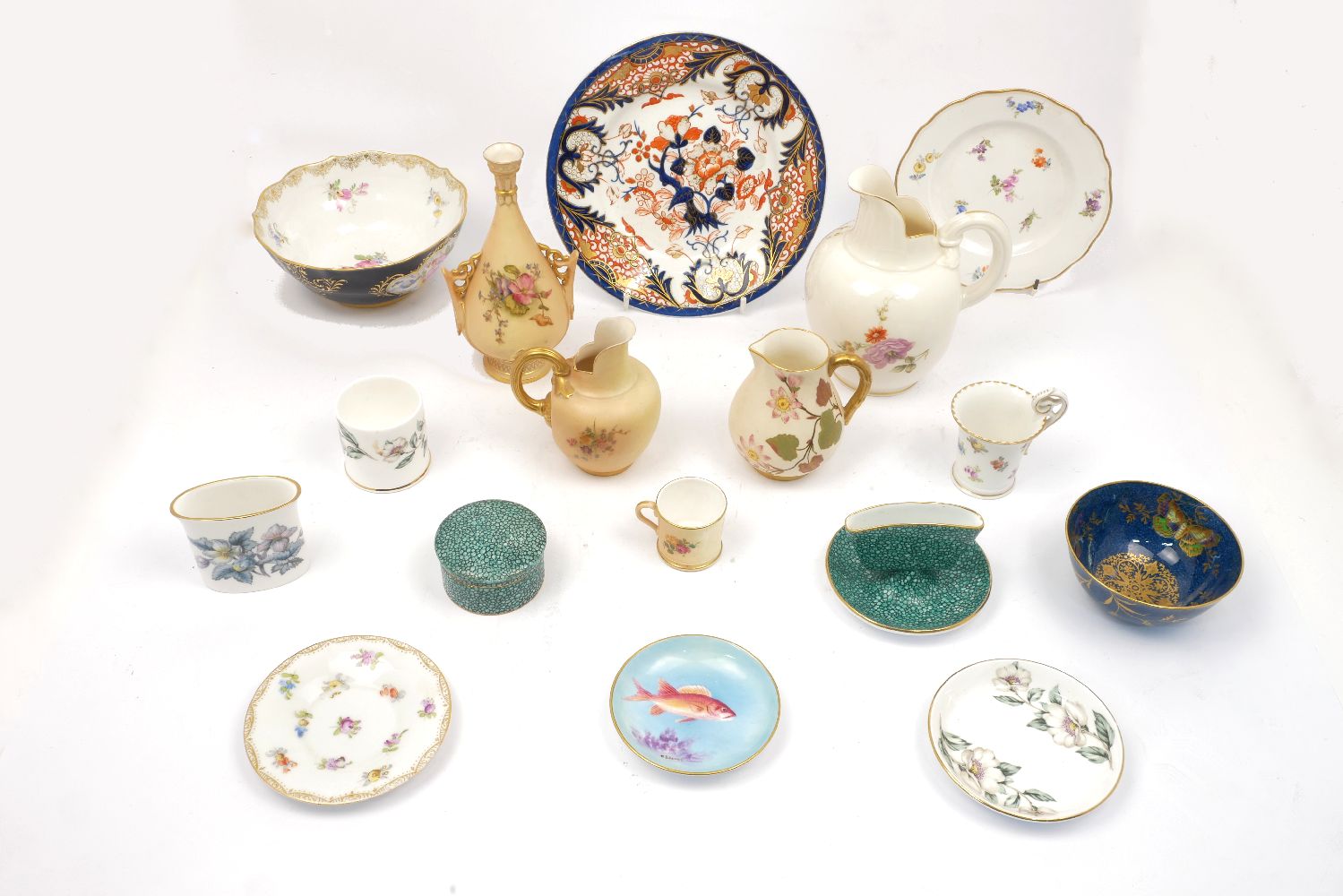 A collection of small porcelain receptacles, by Royal Worcester with an Imari style plate and a