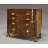 A Regency mahogany and satinwood crossbanded chest, the shaped top with moulded ebony band to