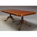 A Georgian taste mahogany extending dining table, late 20th Century, the rounded rectangular top