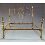 A Victorian brass double bed frame, to include head, two foot posts and side rails, 135cm high,