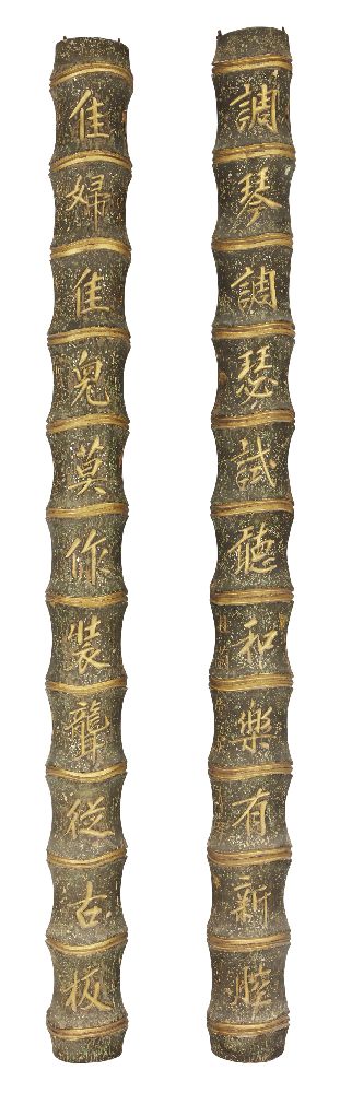 A pair of Chinese wood bamboo-form columns, late Qing dynasty, painted and carved to each section