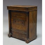 A Regency rosewood cabinet, later adapted to a record player, the hinged top enclosing turntable,