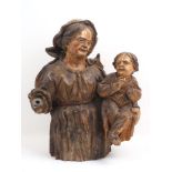 A figural carving, 16th century style, designed as a naturalistic mother and child, carved waist
