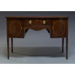 An Edwardian mahogany and line inlaid bow fronted sideboard, with single drawer flanked by two