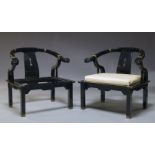 A pair of Chinese black lacquered armchairs, c.1980, with horse shoe backs above rectangular seat