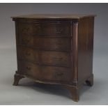 A George III style mahogany serpentine chest of drawers, early to mid 20th Century, with brushing