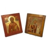 A Russian icon of St Nicholas the Wonder worker, 20th century, together with Christ and Mary, 32 x