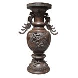 A Japanese bronze three section vase, late 19th/early 20th century, with two ho-o form handles,