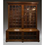 A pair of Samuel Pepys style mahogany and glazed bookcases, second half 20th Century, the moulded