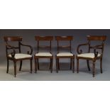 A set of four Regency mahogany bar back dining chairs, with cream upholstered drop in seats, on