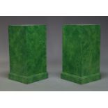 A pair of faux malachite pedestals, second half 20th Century, each of square form, raised on stepped