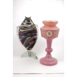 A pink glass vase of baluster form bearing enamelled decoration, together with a Murano glass