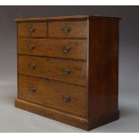 An Edwardian mahogany and inlaid chest, with two short over three long graduated drawers, raised
