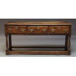 A George III style oak dresser base, late 20th Century incorporating some Georgian elements, with
