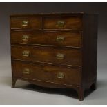 An early Victorian mahogany chest, with two short over three long graduated drawers, raised on