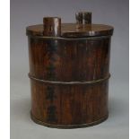 A large Japanese cast iron bound sake barrel, late 19th Century, of cylindrical form, the sides